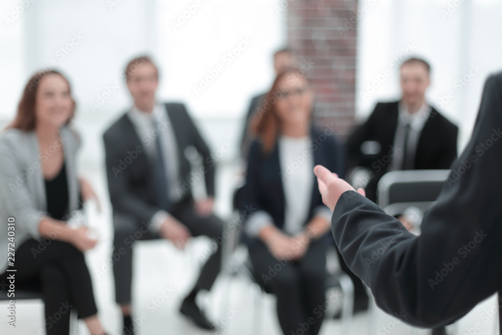 Businessman is making speech at conference room